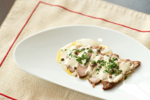 Cold carved veal with tuna, anchovies and caper sauce